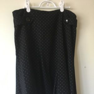 Classic black skirt with white polka dots.